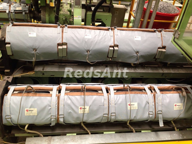Aislamiento de ahorro de energía para la inyección, extrusión y máquinas de moldeo por soplado por una manta de aislamiento de fuego rojo